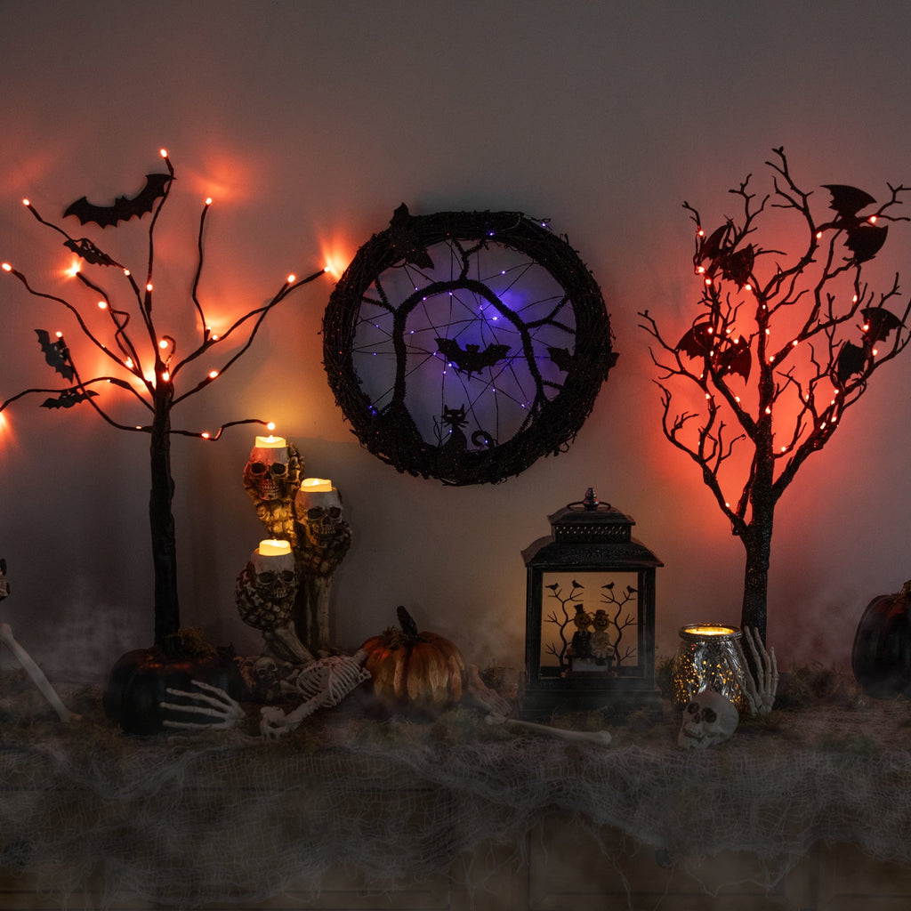 Northlight LED Lighted Black Twig and Bats Small Halloween Wreath - 13" - Purple Lights