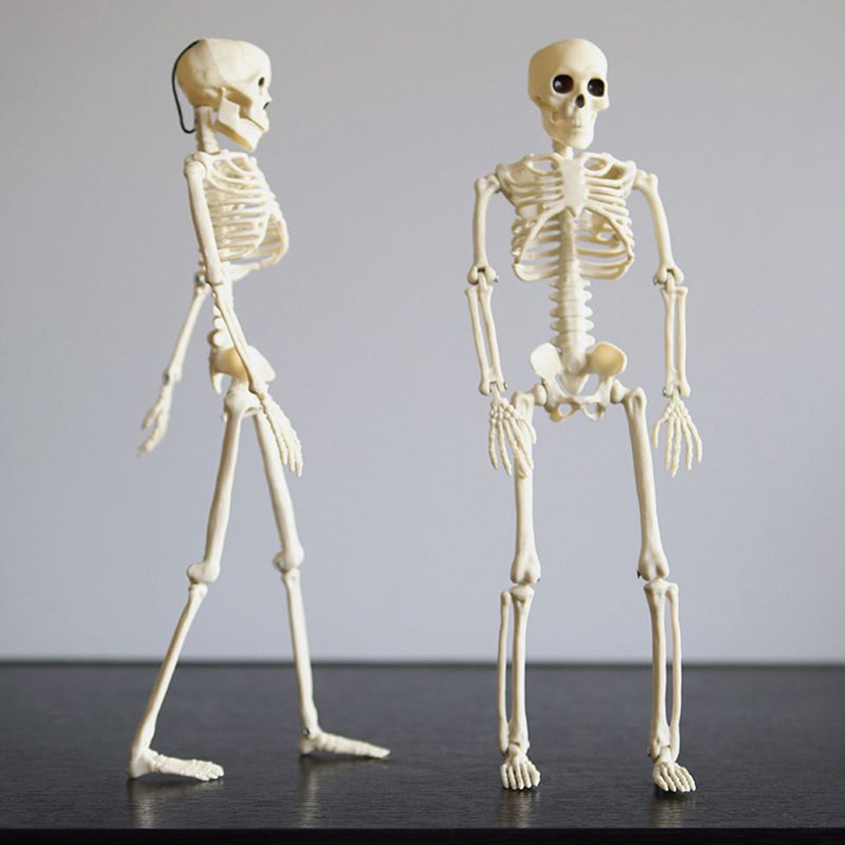 Beautynvta Posable Halloween Skeletons Decor, 15''x4.7'' Small Hanging Skeleton with Movable Joints for Halloween Decorations, Graveyard Props