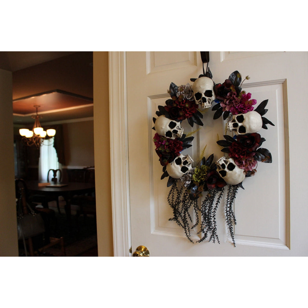 Haunted Hill Farm 24 in Hanging Wreath with Skulls, Fall Flowers, and Vines, Indoor/Covered Outdoor Halloween Props Decoration, HHWTHSKL-2