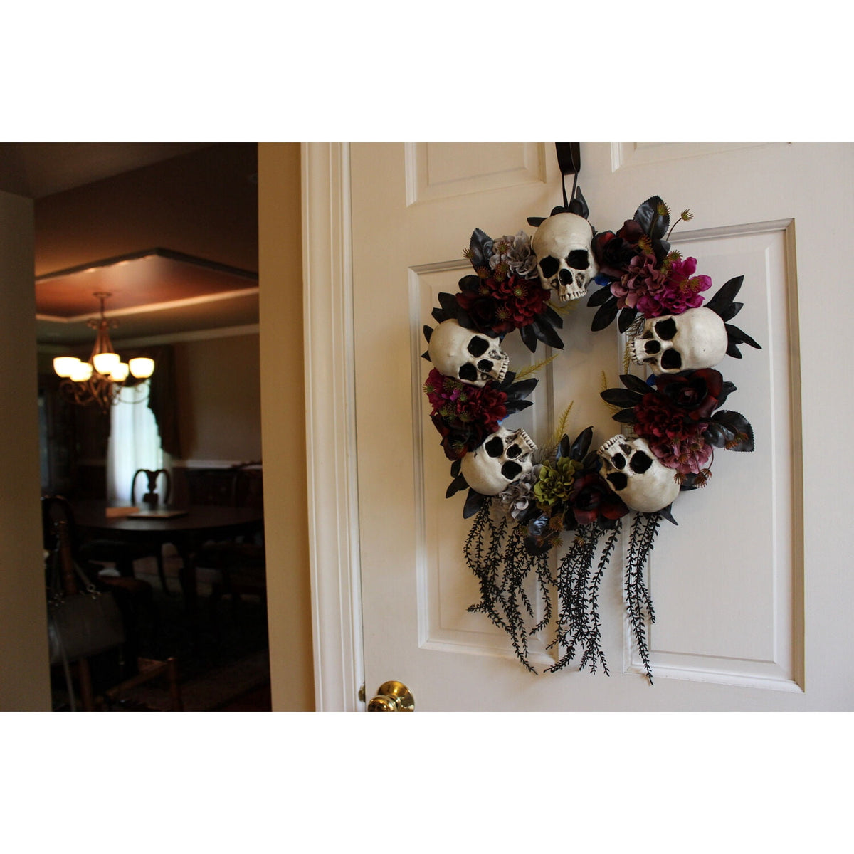 Haunted Hill Farm 24 in Hanging Wreath with Skulls, Fall Flowers, and Vines, Indoor/Covered Outdoor Halloween Props Decoration, HHWTHSKL-2