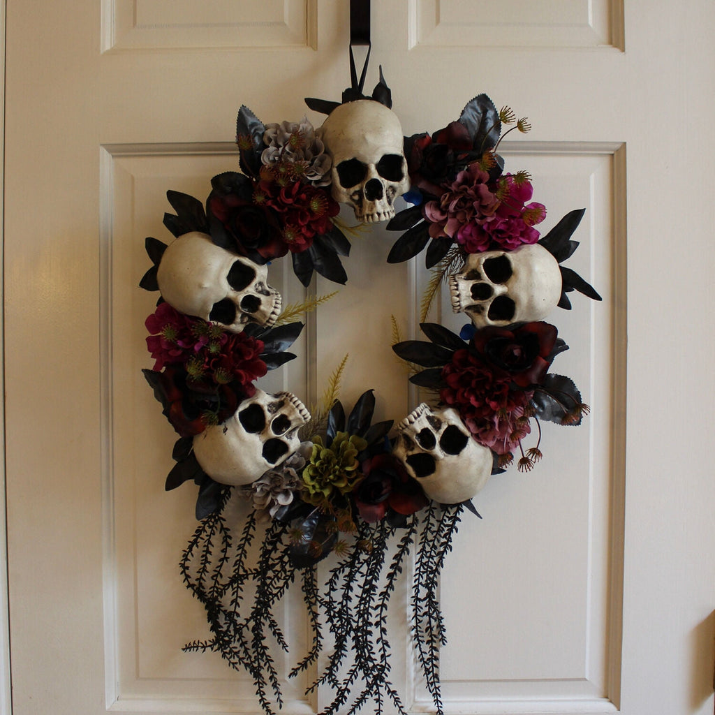 Haunted Hill Farm 24 in Hanging Wreath with Skulls, Fall Flowers, and Vines, Indoor/Covered Outdoor Halloween Props Decoration, HHWTHSKL-2